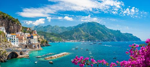 A landscape photo of mountains and water