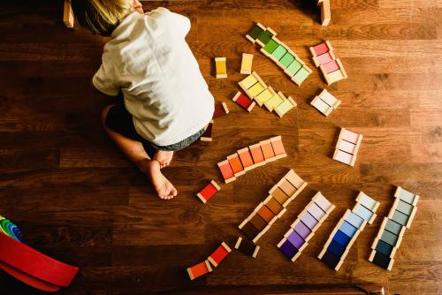 Boy with Montessori color tablets