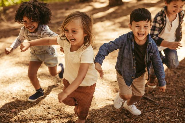 Laughing children running away